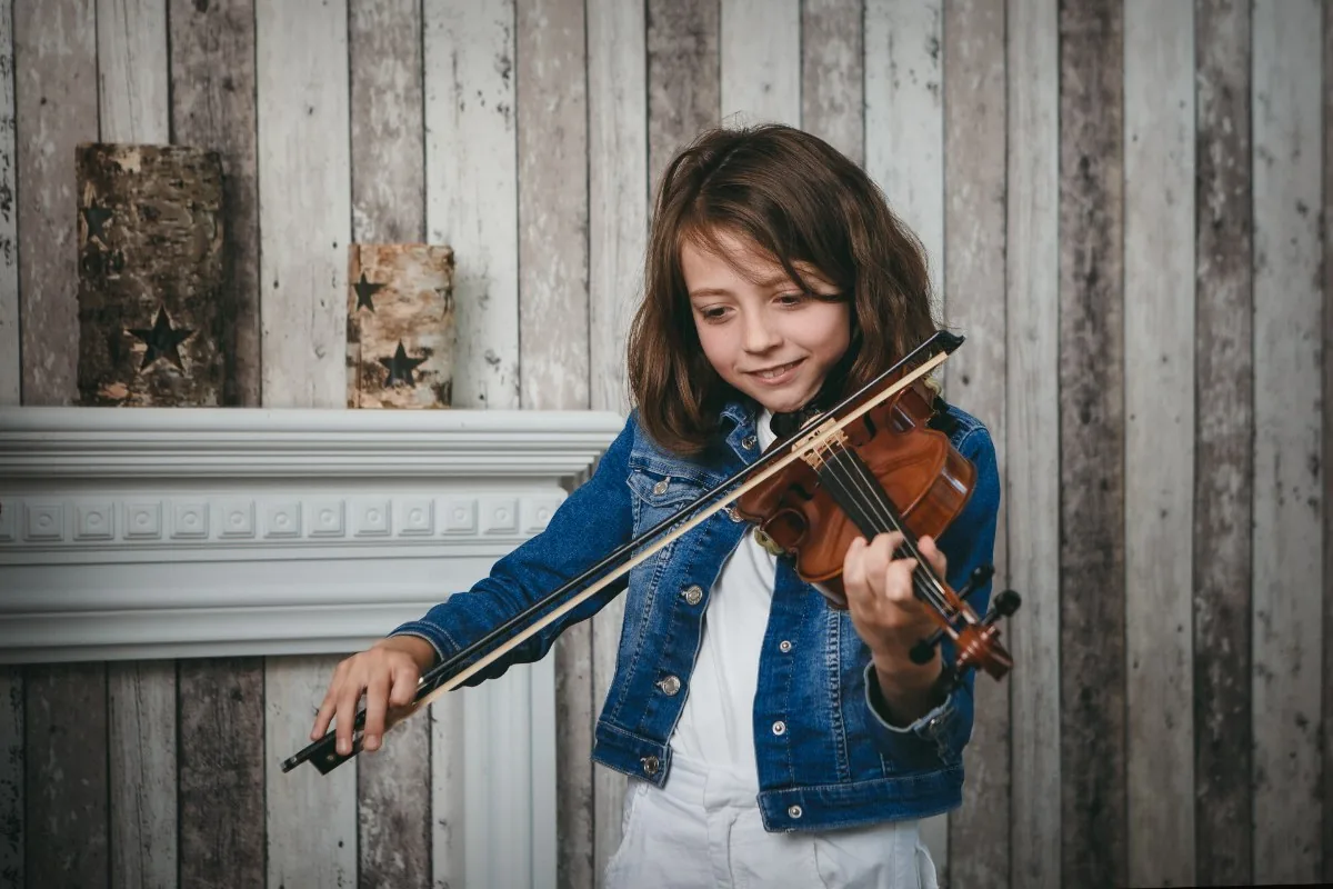 Violin lesson: a student with her violin